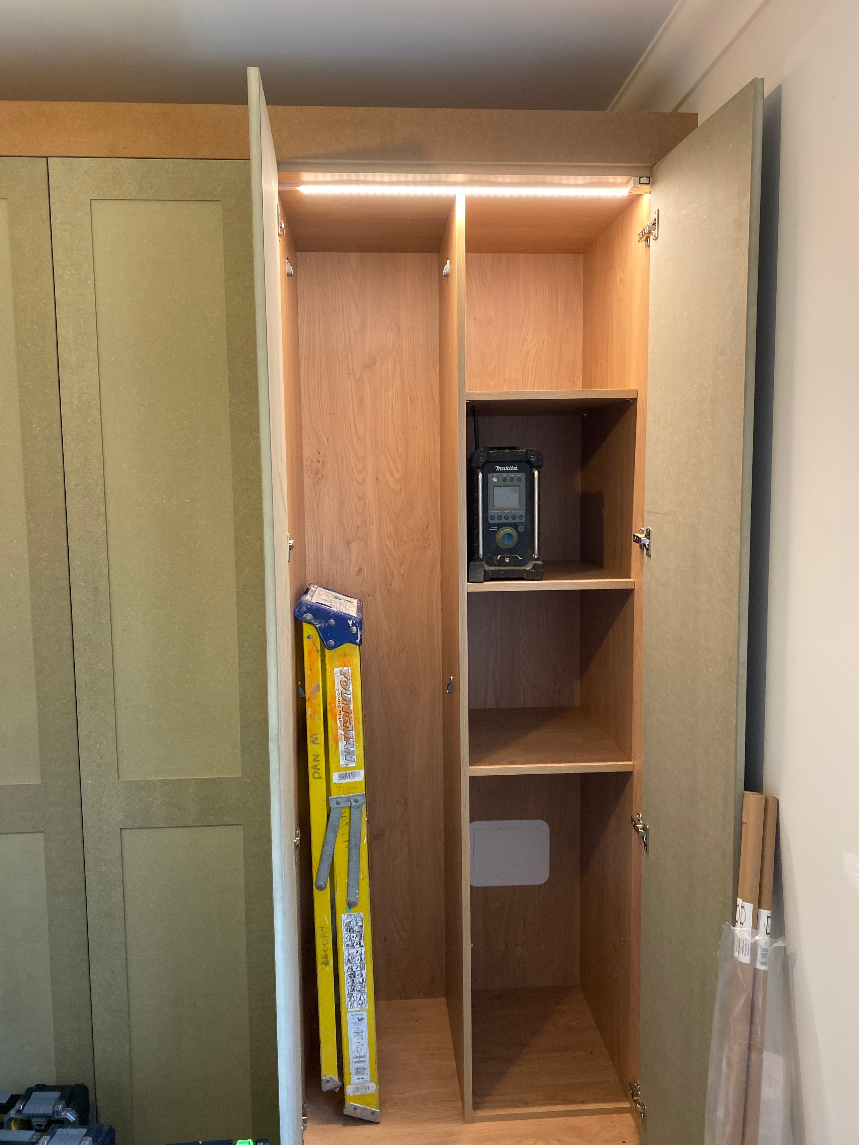 Kitchen cabinet LED strip lighting installation