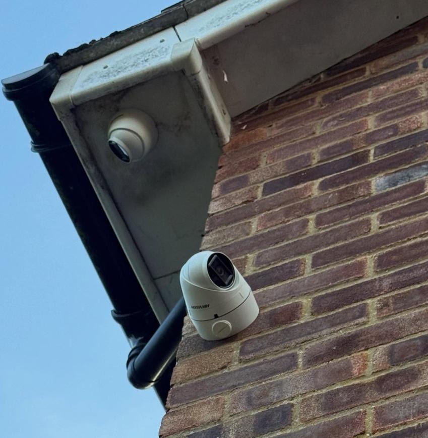 CCTV cameras on brick exterior